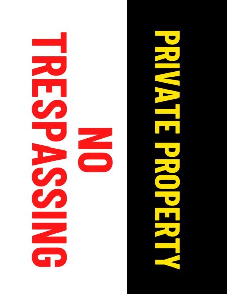 Private Property in yellow on black background No Trespassing in red on white background horizontal sign
